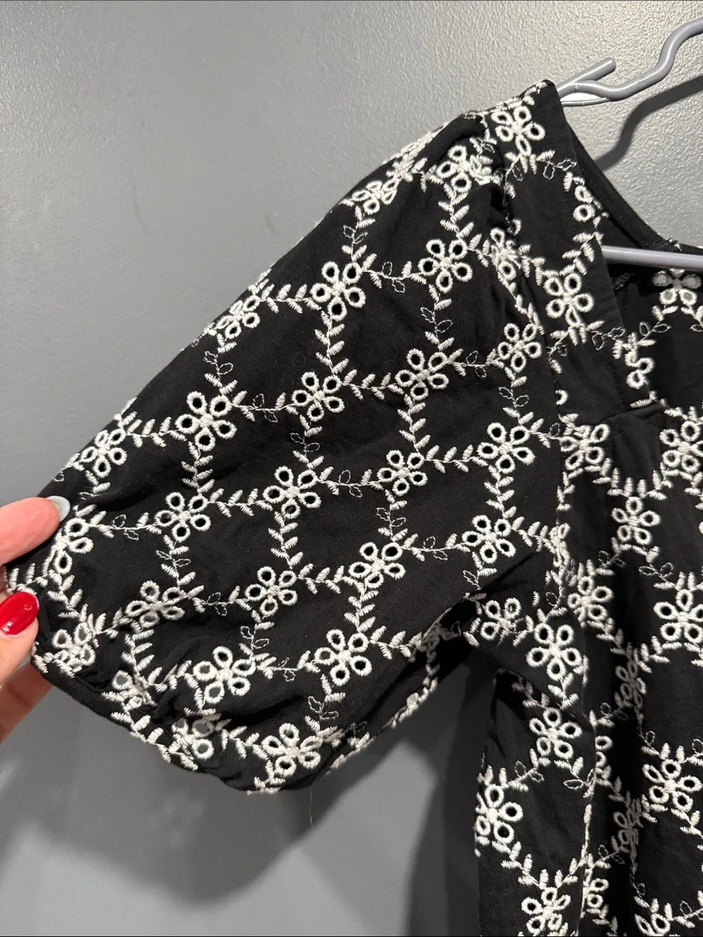 LOFT Black Top with White Floral Lattice Embroidery and Puff Sleeves